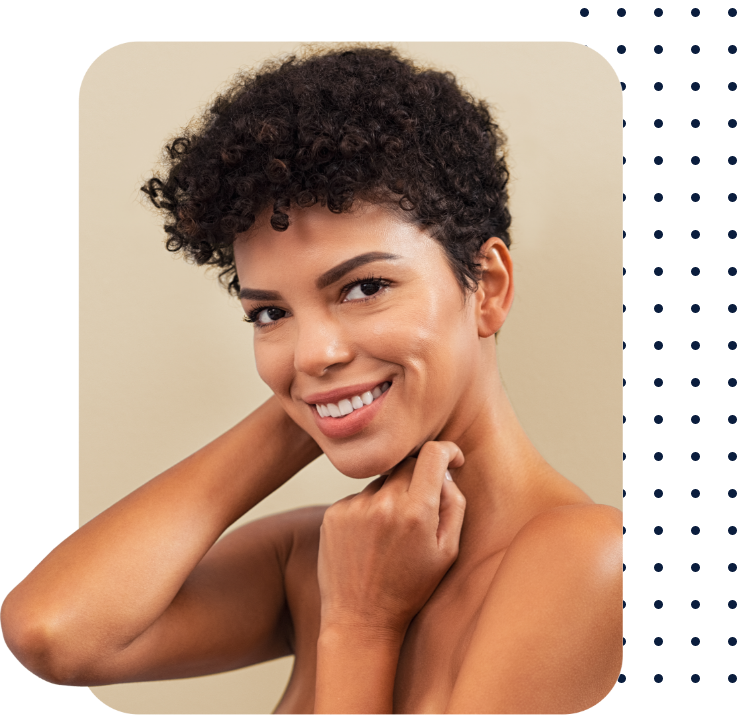 Woman with short curly hair smiling