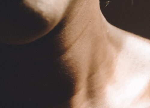 Photo of a woman's neck and thyroid area